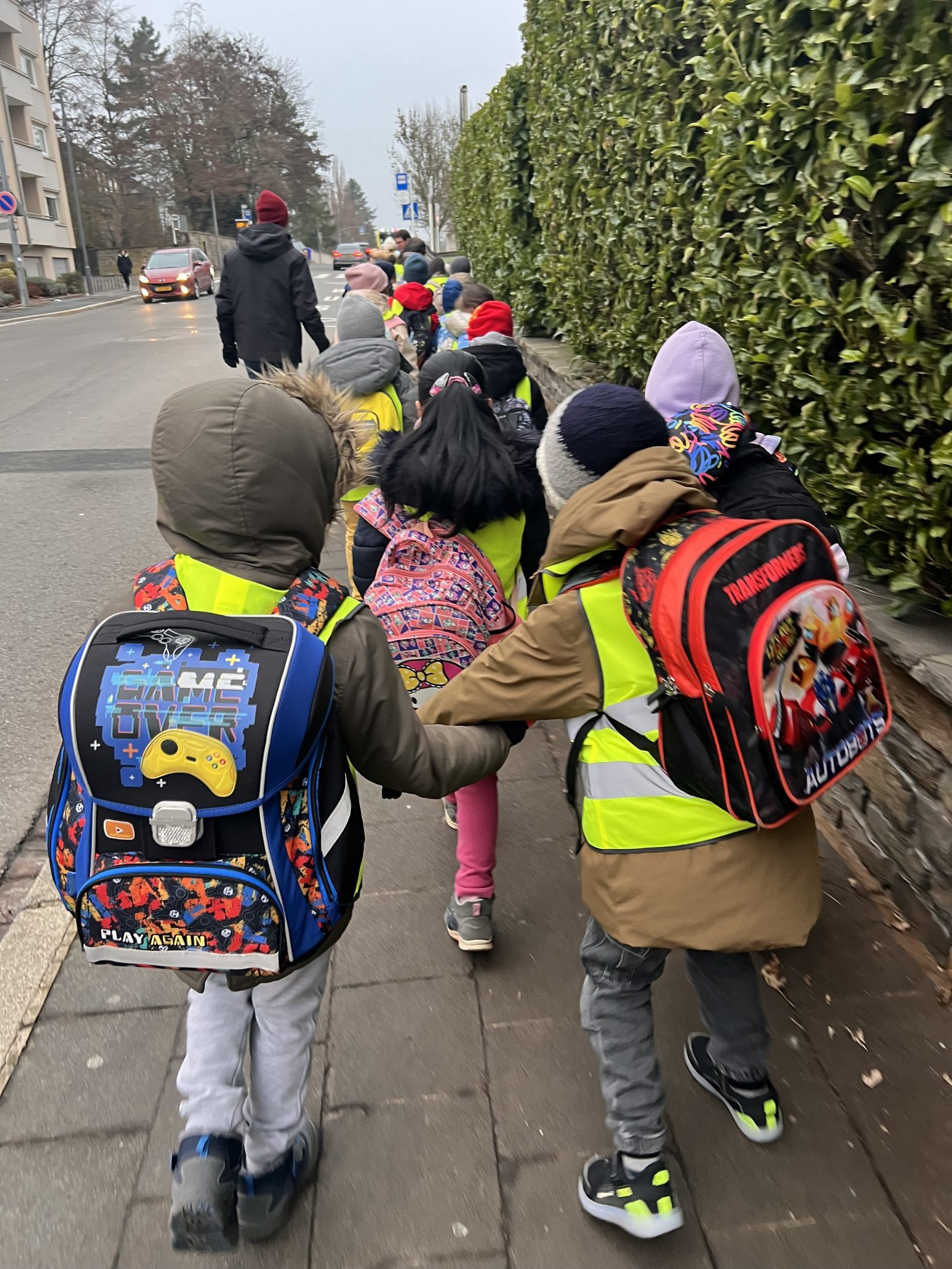 Children walking to school together in Luxembourg